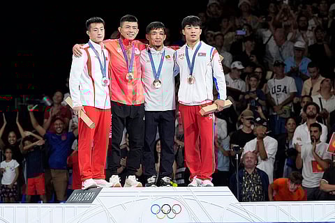 Paris Olympics men's Greco-Roman 60kg wrestling: China's Liguo Cao, silver, Japan's Kenichiro Fumita, gold, Kyrgyzstan's Zholaman Sharshenbekov, North Korea's Se Ung Ri, bronze